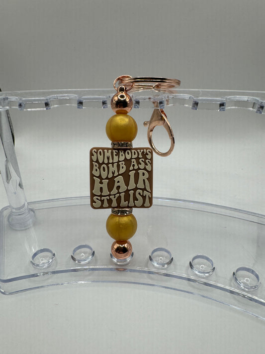 "Somebody's Bomb Ass Hair Stylist" Keychain